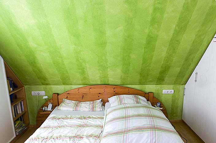 Schlafzimmer mit freigestaltete Toscana Lasur